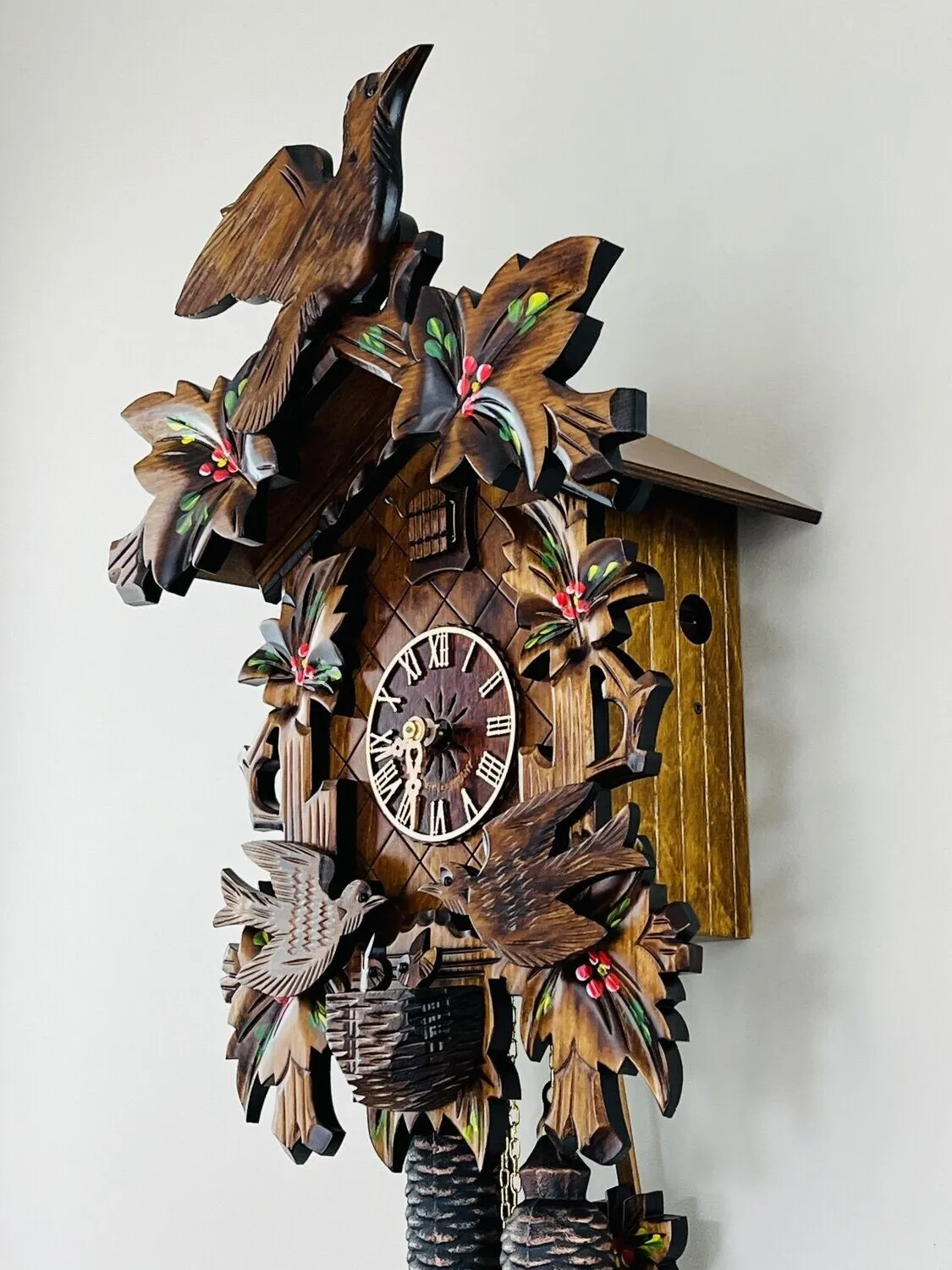 Eight Day Cuckoo Clock with Hand-painted Flowers, Leaves, and Animated Birds Feeding Baby Birds