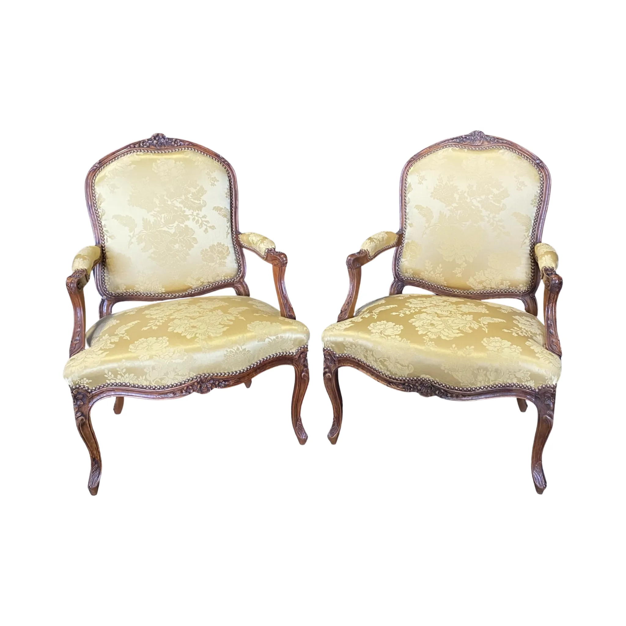 Pair of French Louis XV Walnut Carved Fauteuils or Arm Chairs with Pale Flaxen Yellow Damask and Brass Tacking