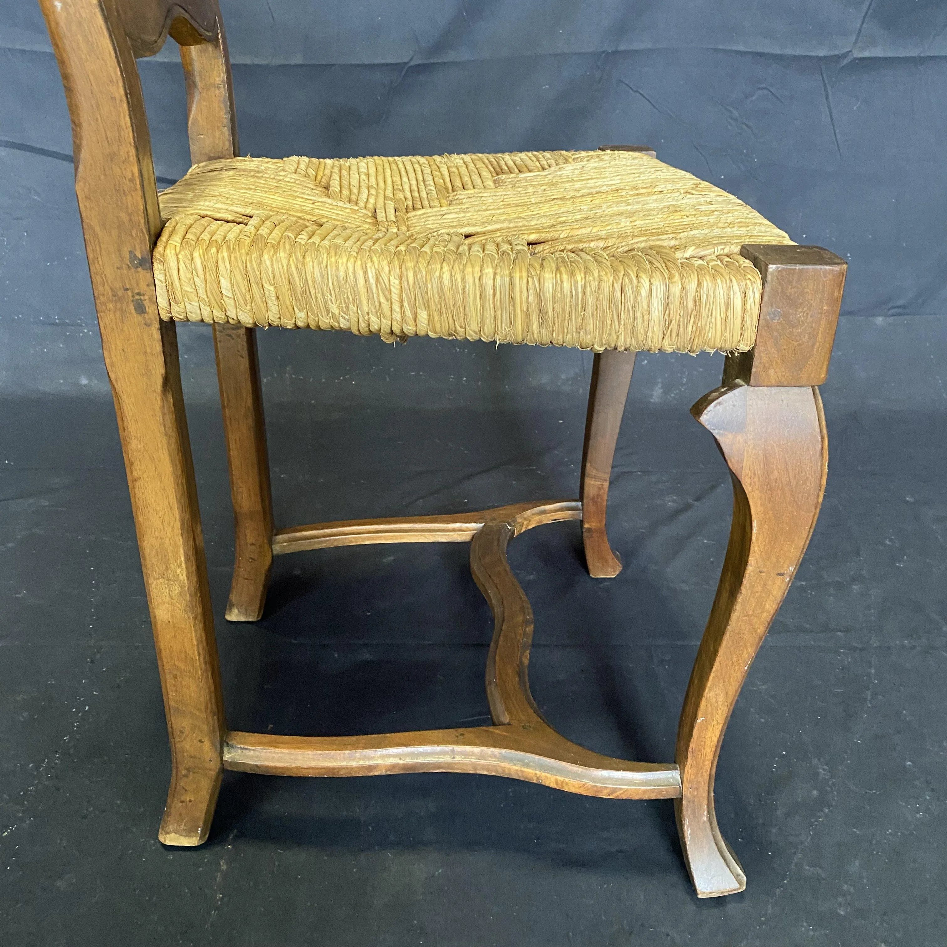 Set of Four 19th Century Country French Provincial Walnut Dining Chairs with Patterned Rush Seats