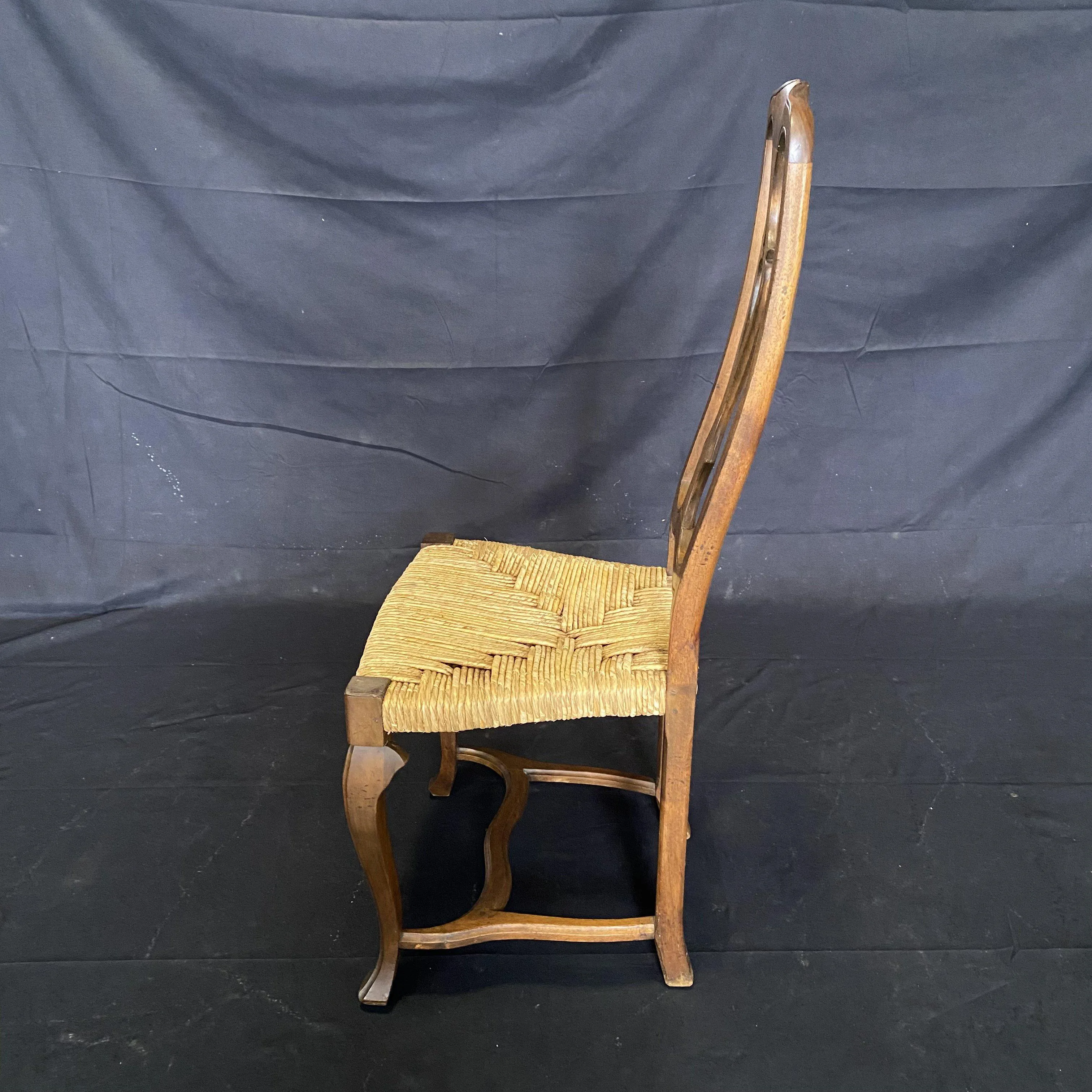 Set of Four 19th Century Country French Provincial Walnut Dining Chairs with Patterned Rush Seats