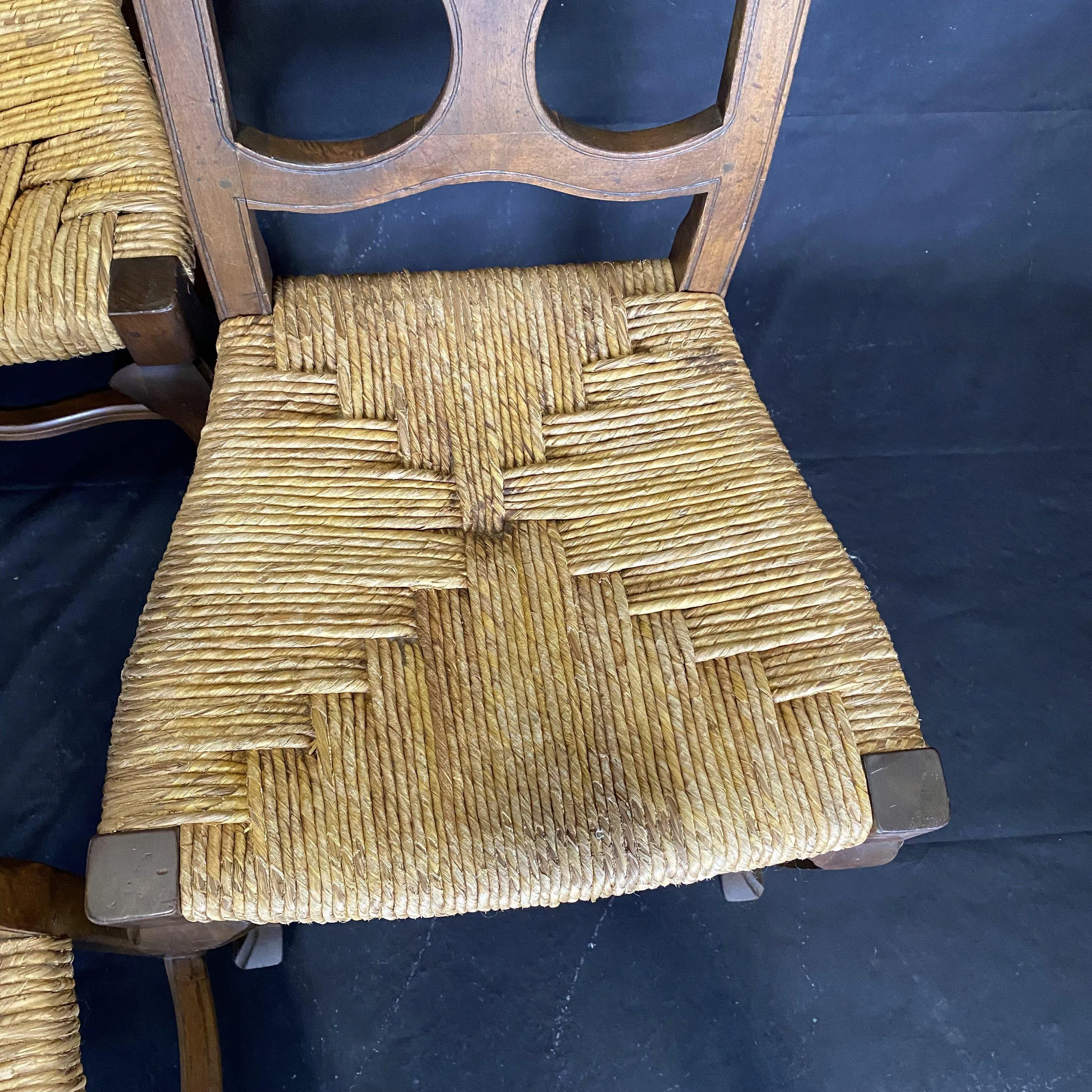 Set of Four 19th Century Country French Provincial Walnut Dining Chairs with Patterned Rush Seats