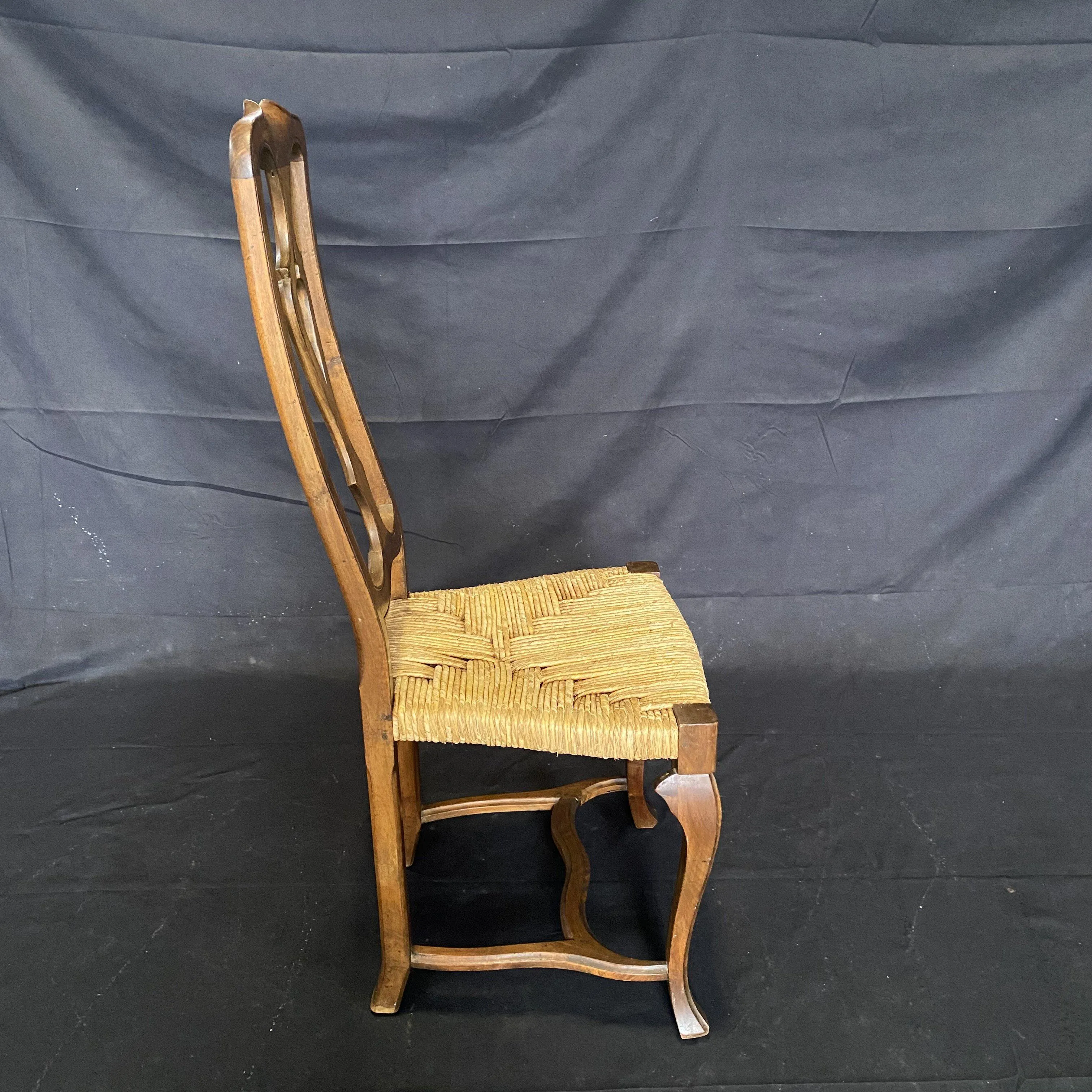 Set of Four 19th Century Country French Provincial Walnut Dining Chairs with Patterned Rush Seats