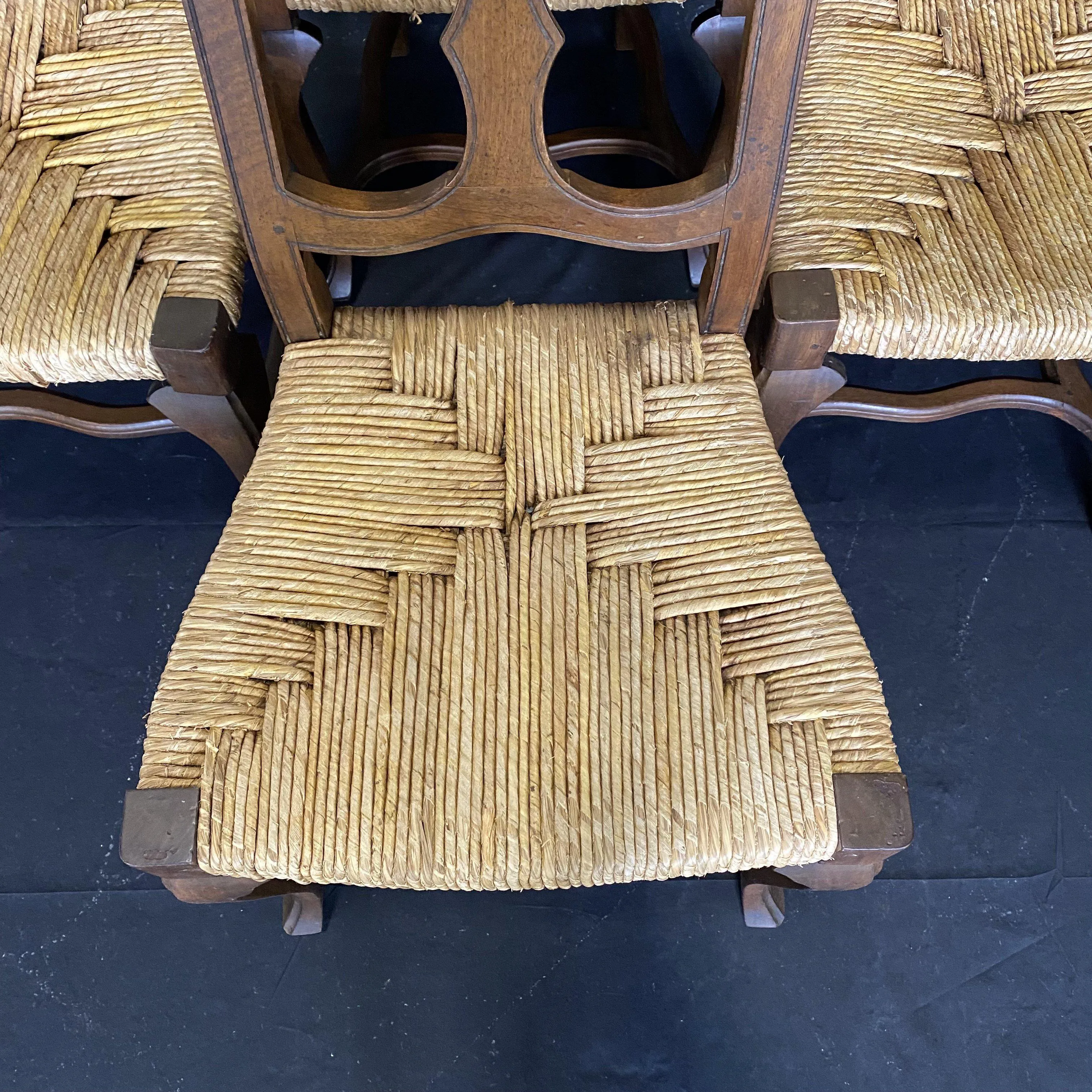 Set of Four 19th Century Country French Provincial Walnut Dining Chairs with Patterned Rush Seats