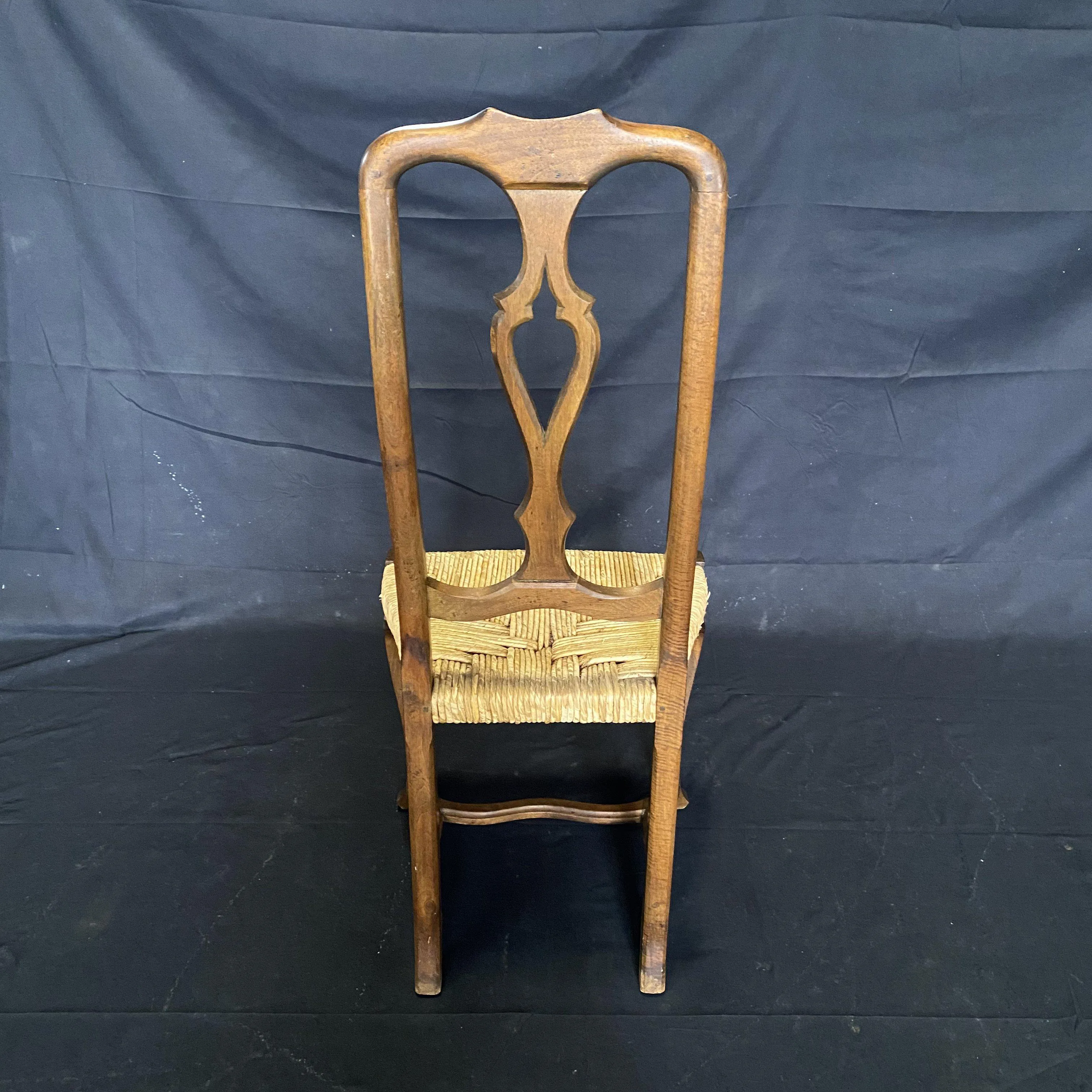 Set of Four 19th Century Country French Provincial Walnut Dining Chairs with Patterned Rush Seats