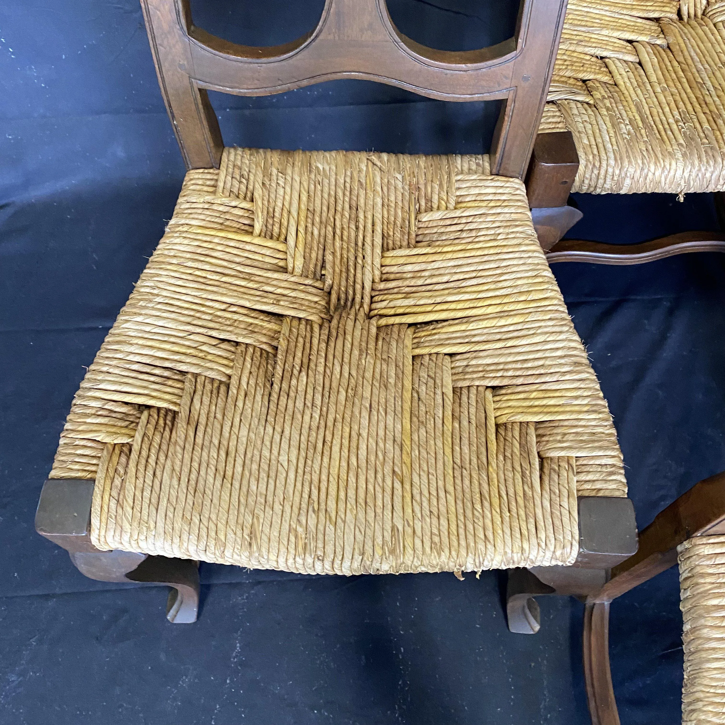 Set of Four 19th Century Country French Provincial Walnut Dining Chairs with Patterned Rush Seats