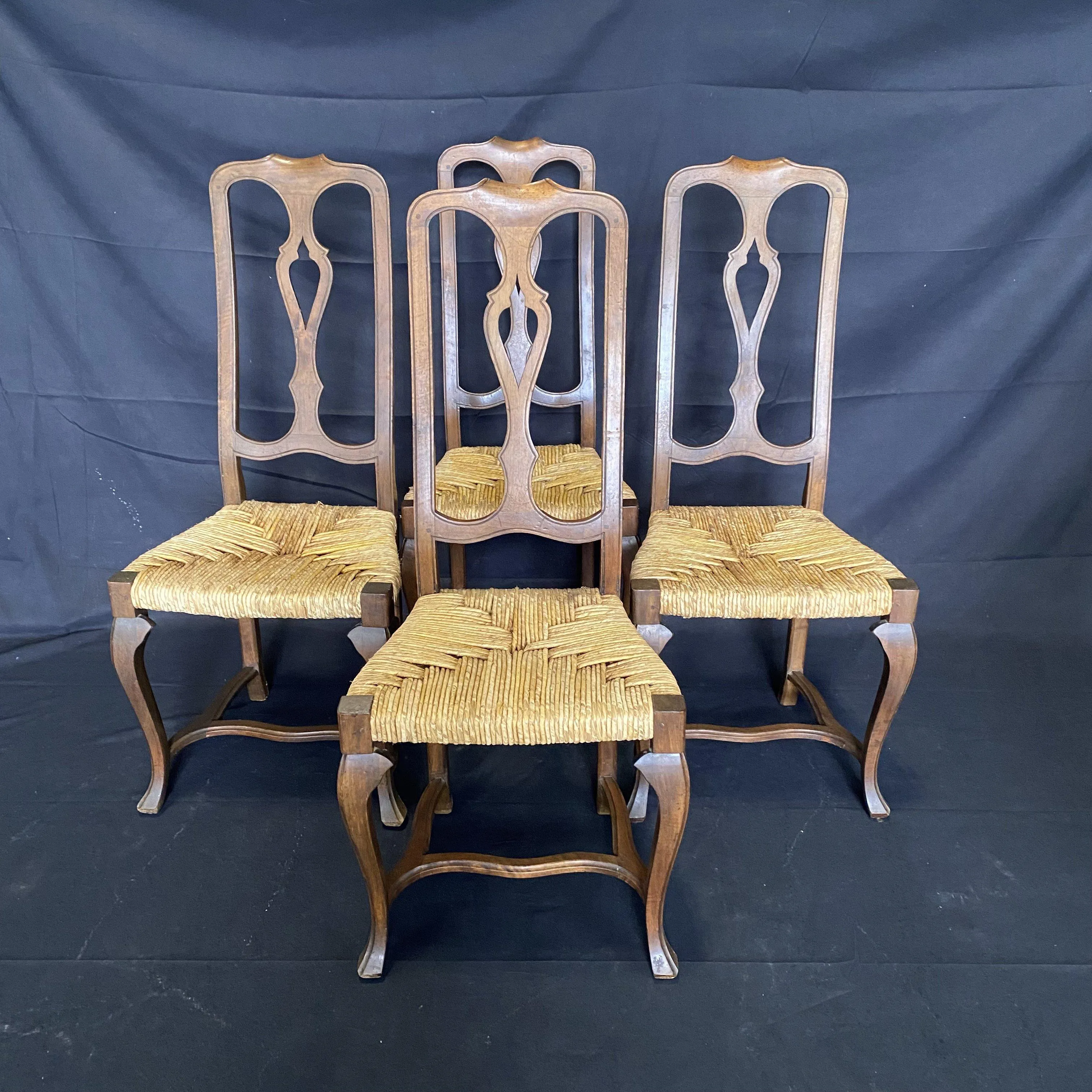 Set of Four 19th Century Country French Provincial Walnut Dining Chairs with Patterned Rush Seats