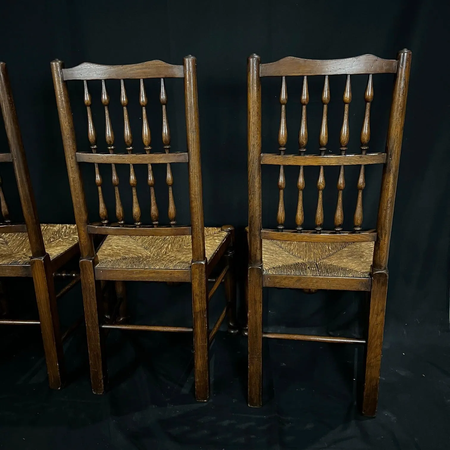 Set of Four Early 19th Century Carved British Oak Dining Chairs or Side Chairs with Original Patina and Rush Seats