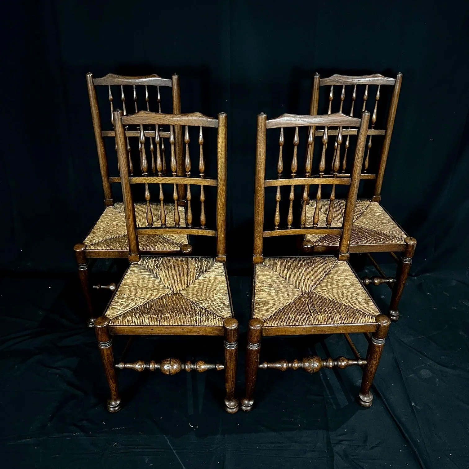 Set of Four Early 19th Century Carved British Oak Dining Chairs or Side Chairs with Original Patina and Rush Seats