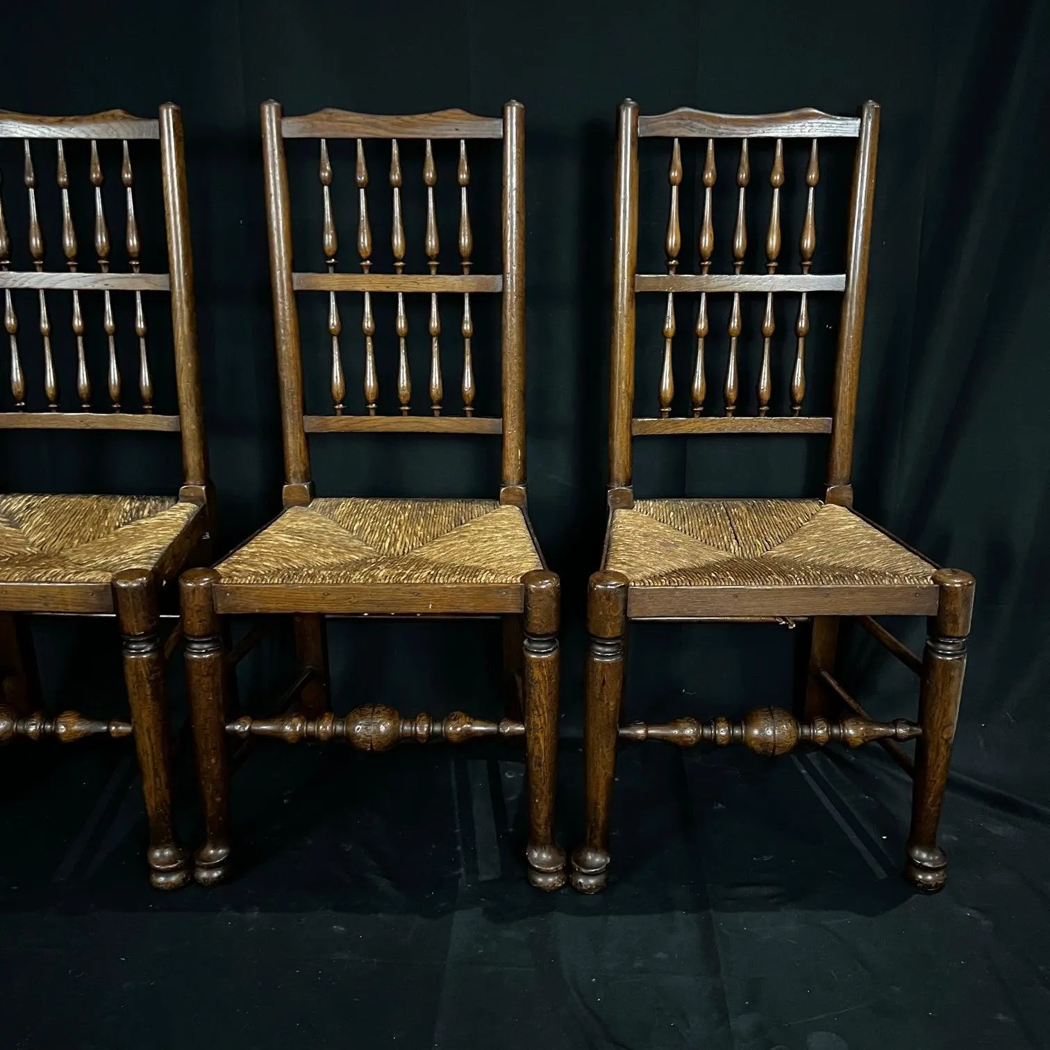 Set of Four Early 19th Century Carved British Oak Dining Chairs or Side Chairs with Original Patina and Rush Seats