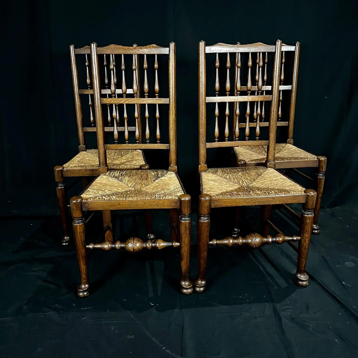 Set of Four Early 19th Century Carved British Oak Dining Chairs or Side Chairs with Original Patina and Rush Seats