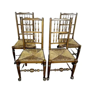 Set of Four Early 19th Century Carved British Oak Dining Chairs or Side Chairs with Original Patina and Rush Seats