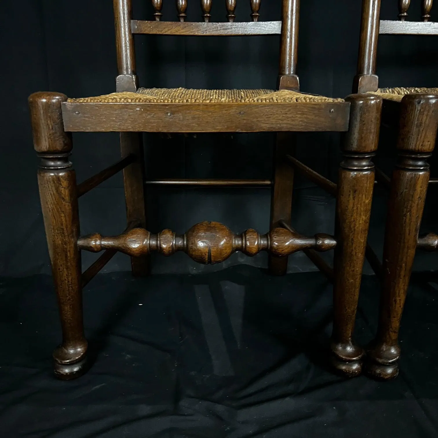 Set of Four Early 19th Century Carved British Oak Dining Chairs or Side Chairs with Original Patina and Rush Seats