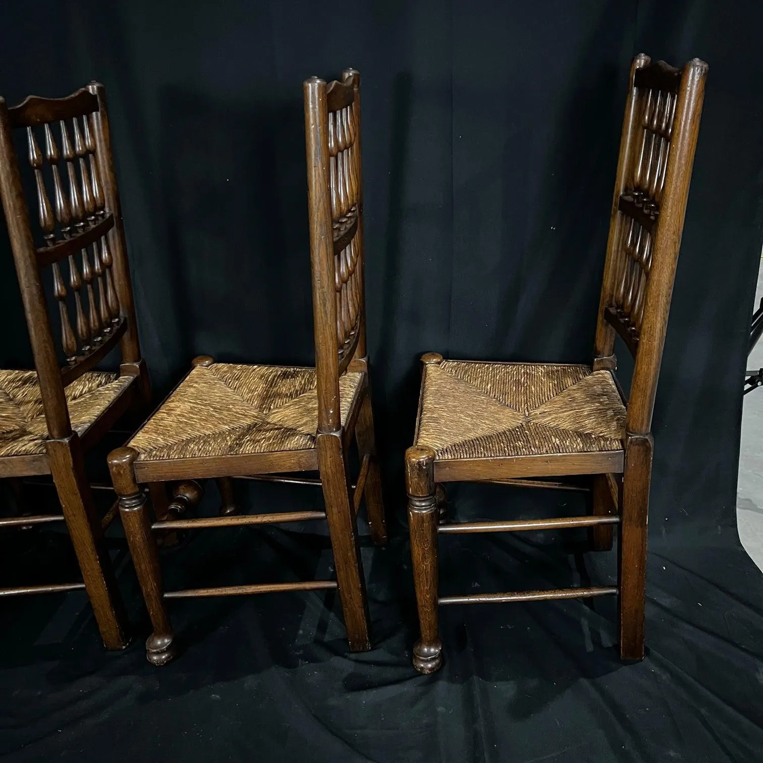 Set of Four Early 19th Century Carved British Oak Dining Chairs or Side Chairs with Original Patina and Rush Seats