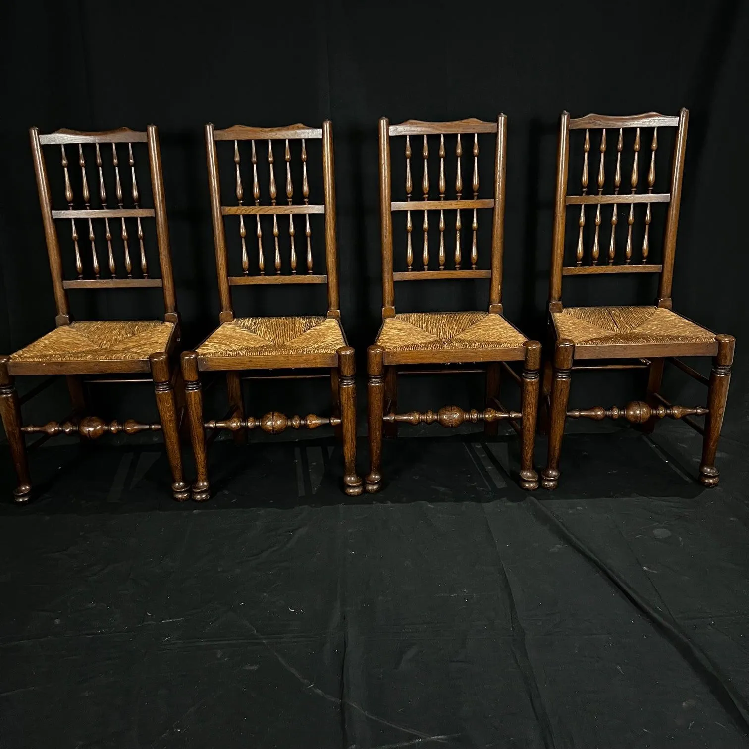 Set of Four Early 19th Century Carved British Oak Dining Chairs or Side Chairs with Original Patina and Rush Seats