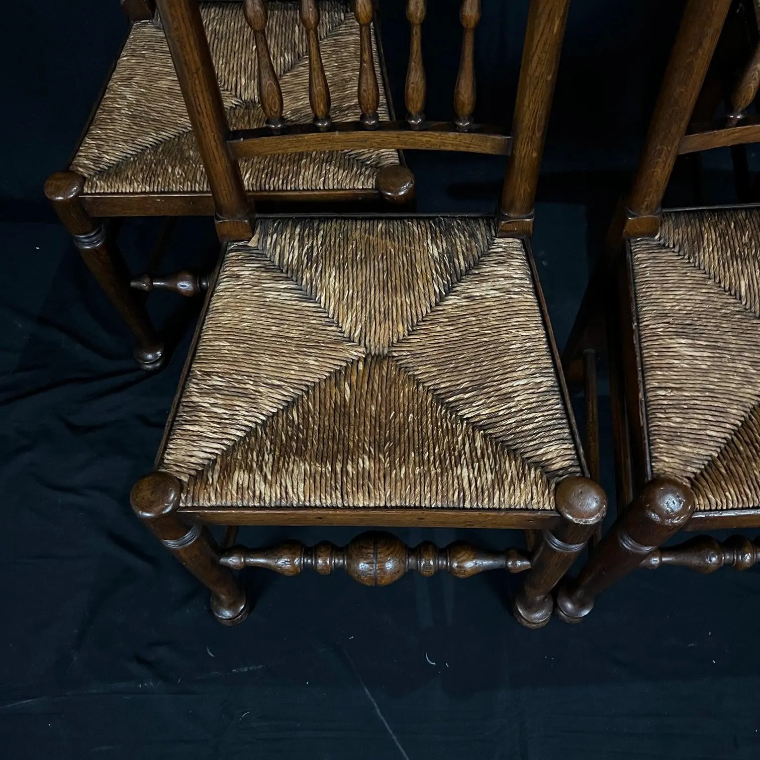 Set of Four Early 19th Century Carved British Oak Dining Chairs or Side Chairs with Original Patina and Rush Seats