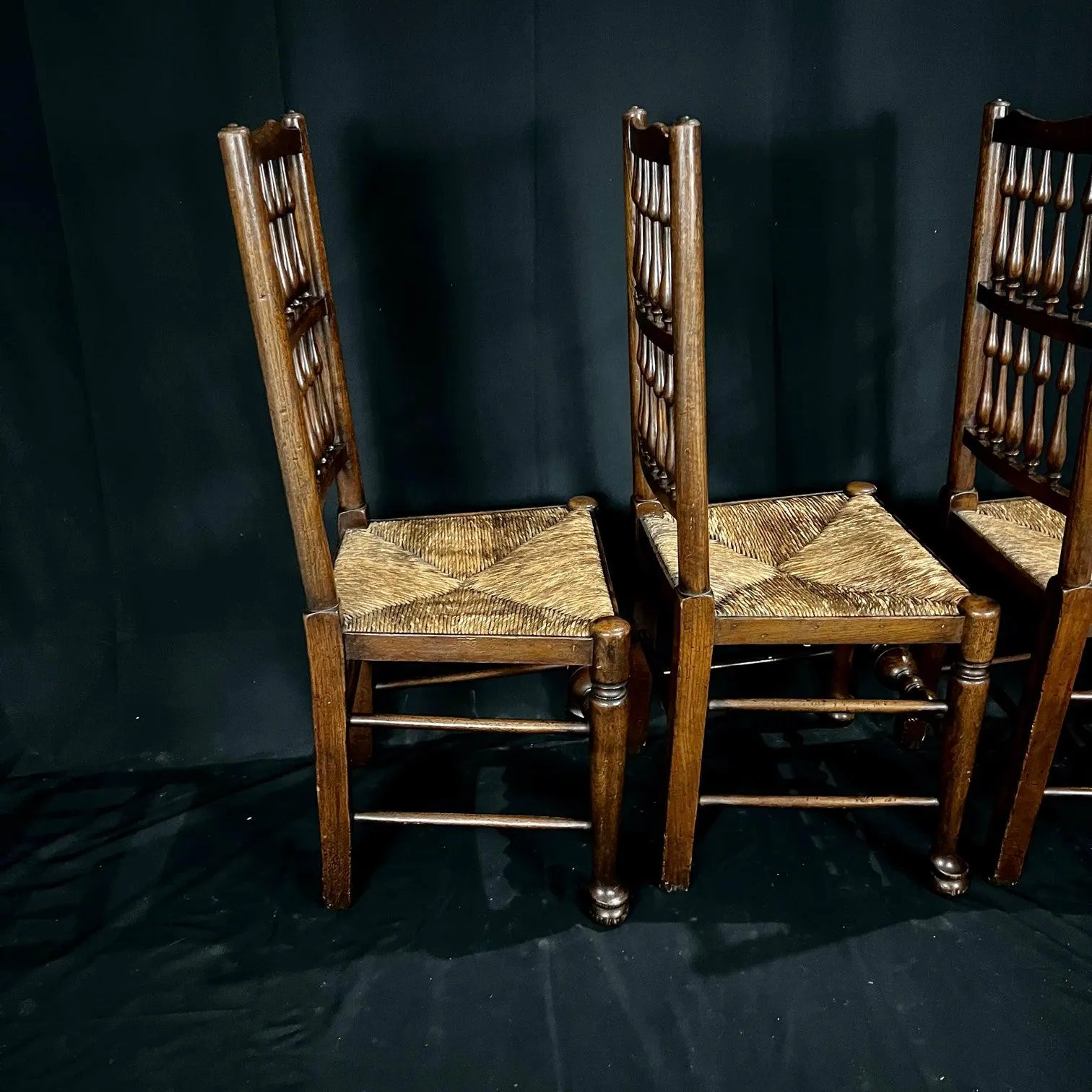 Set of Four Early 19th Century Carved British Oak Dining Chairs or Side Chairs with Original Patina and Rush Seats