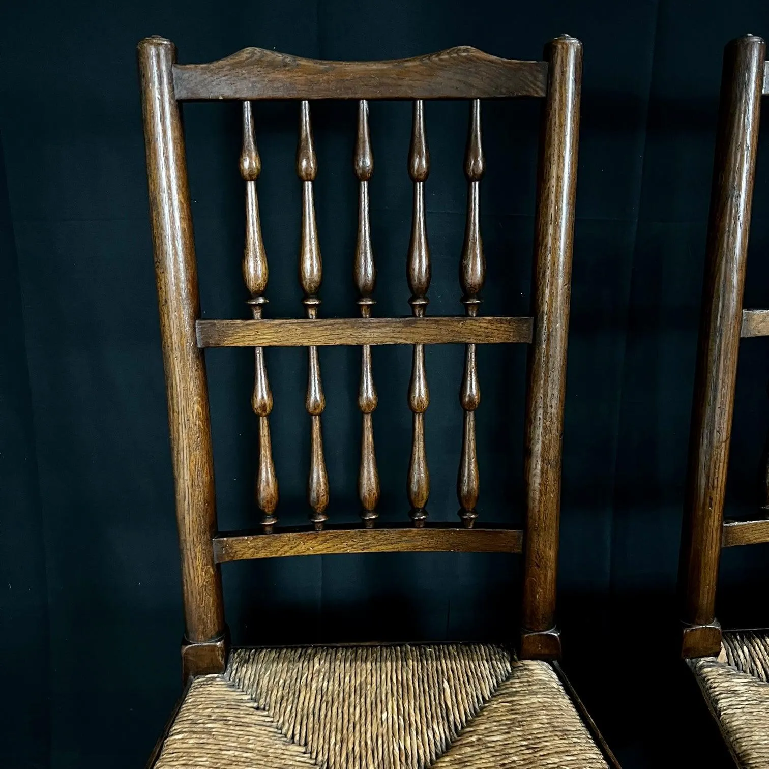 Set of Four Early 19th Century Carved British Oak Dining Chairs or Side Chairs with Original Patina and Rush Seats