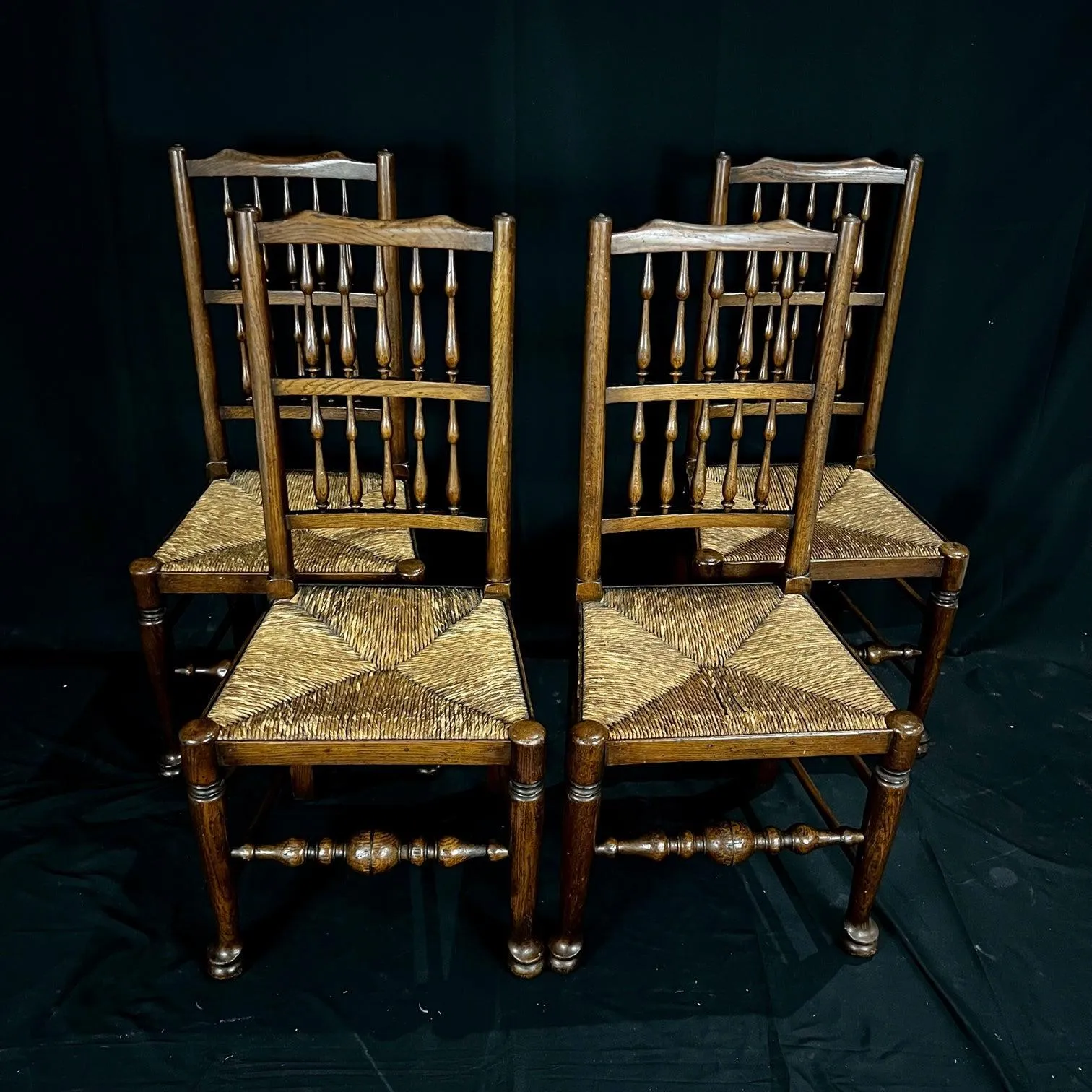 Set of Four Early 19th Century Carved British Oak Dining Chairs or Side Chairs with Original Patina and Rush Seats