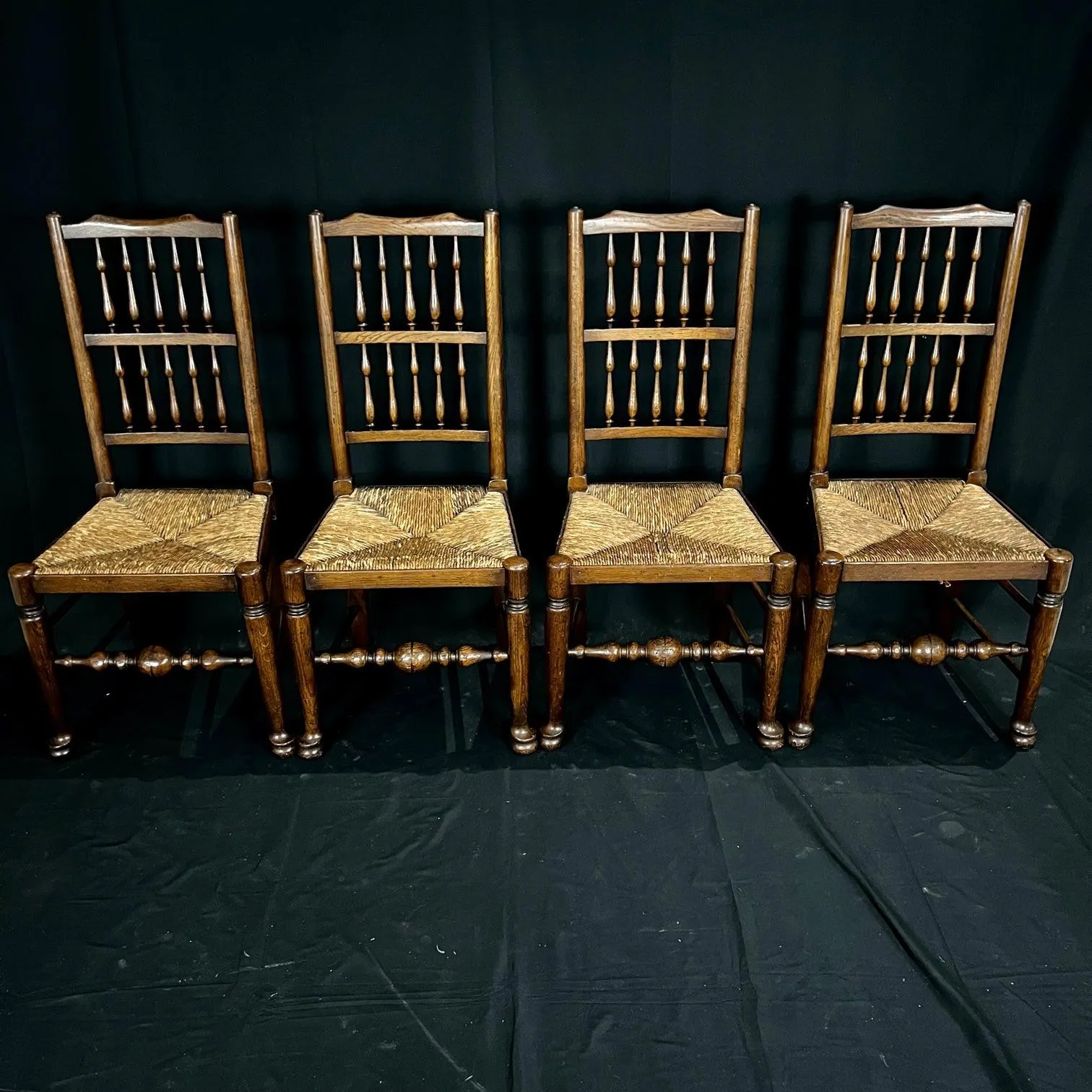 Set of Four Early 19th Century Carved British Oak Dining Chairs or Side Chairs with Original Patina and Rush Seats