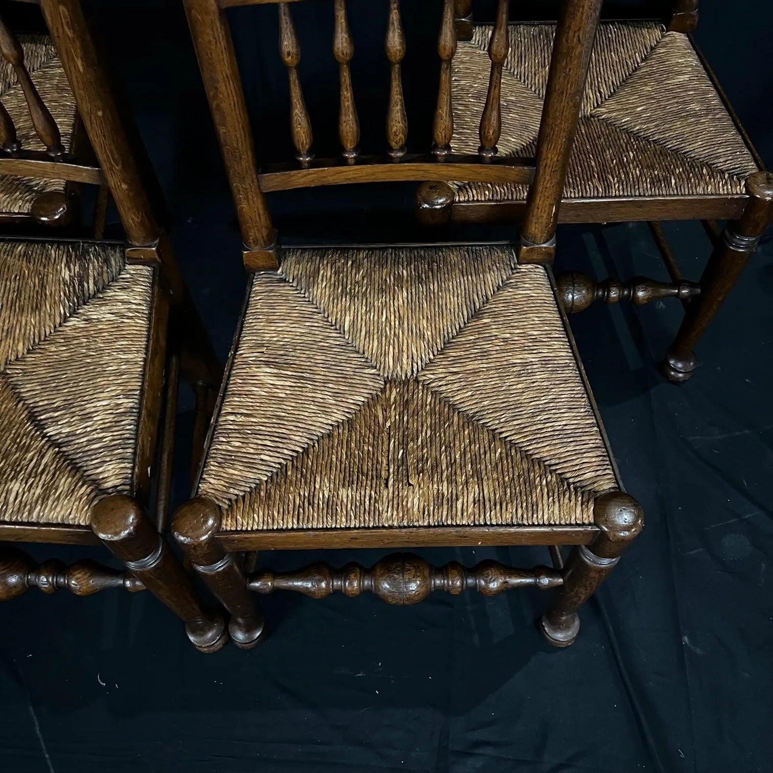 Set of Four Early 19th Century Carved British Oak Dining Chairs or Side Chairs with Original Patina and Rush Seats