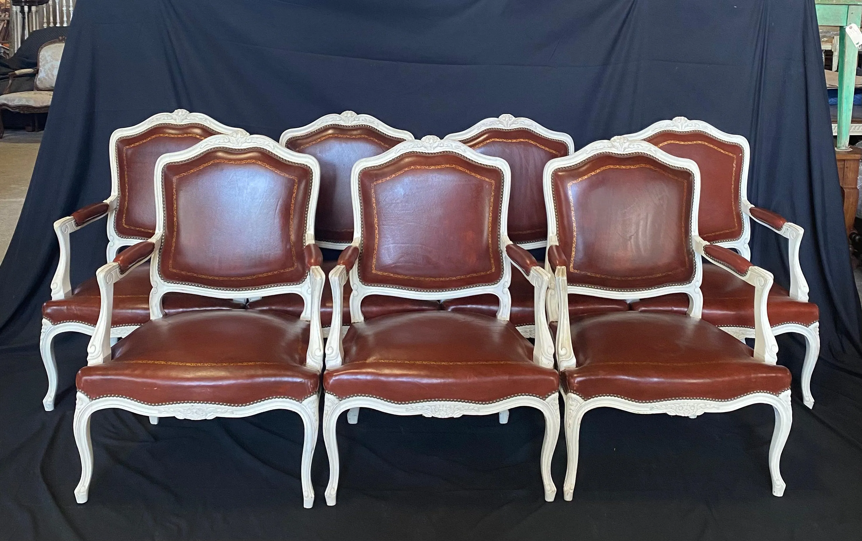 Set of Seven French Louis XV Leather Embossed Armchairs or Fauteuils